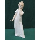 NAO GLAZED CERAMIC FIGURE OF A YAWNING GIRL,