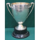 CHRISTOFLE SILVER PLATED ART NOUVEAU STYLE TWO HANDLED TROPHY ON EBONISED STAND,