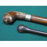 INTERESTING CARVED WALKING STICK WITH SILVER COLOURED MOUNT, INSCRIBED 'HMS NAIAD 1797-1897'.