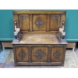 HEAVILY CARVED OAK MONKS BENCH WITH LIFT UP SEAT