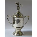 HALLMARKED SILVER TWO HANDLED TROPHY WITH COVER FEATURING A GOLFER, BIRMINGHAM ASSAY, DATED 1929,