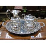 ART DECO STYLE SILVER PLATED FOUR PIECE TEASET ON FLORAL DECORATED TWO HANDLED OVAL SERVING TRAY