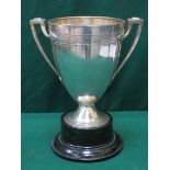 CHRISTOFLE SILVER PLATED ART NOUVEAU STYLE TWO HANDLED TROPHY ON EBONISED STAND,