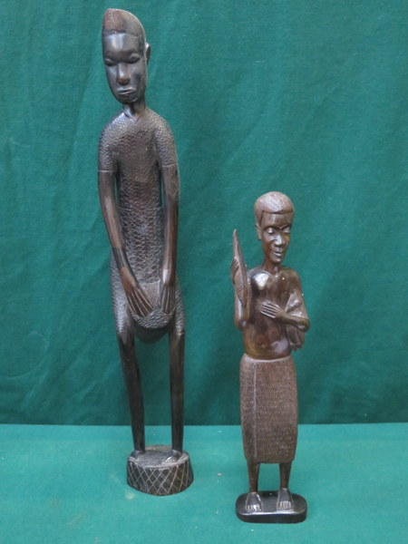 TWO HEAVILY CARVED AFRICAN STYLE TREEN FIGURES,