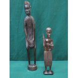 TWO HEAVILY CARVED AFRICAN STYLE TREEN FIGURES,