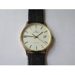 9ct GOLD GARRARD GENT'S WRISTWATCH ON LEATHER STRAP,