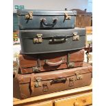 FOUR VARIOUS VINTAGE SUITCASES