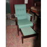 OAK AND MAHOGANY FRAMED UPHOLSTERED ARMCHAIR WITH PULL OUT FOOT STOOL AND LIFT UP TRAY TO RIGHT