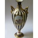 ROYAL CROWN DERBY GILDED CERAMIC TWO HANDLED VASE WITH HANDPAINTED CHURCH SCENE,