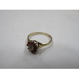 9ct GOLD DRESS RING SET WITH RUBY COLOURED STONES AND CLEAR STONE