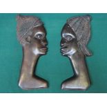 PAIR OF CARVED AFRICAN STYLE TREEN WALL HANGINGS,