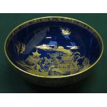 CARLTONWARE HEAVILY GILDED CERAMIC BOWL DECORATED WITH ORIENTAL SCENES, DIAMETER APPROXIMATELY 25.