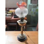 VINTAGE BRASS COLUMN FORM OIL LAMP WITH COLOURED GLASS SHADE