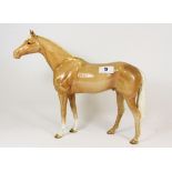 A large Beswick figure of a bay horse H28.5cms