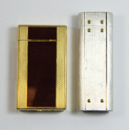A Cartier lighter and a Corona lighter