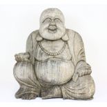 A carved wooden figure of a seated happy Buddha H30cms