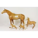 A large Beswick horse figure and 3 others, all A/F