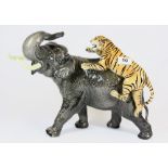 A large Beswick figure of an elephant and tiger H30cms