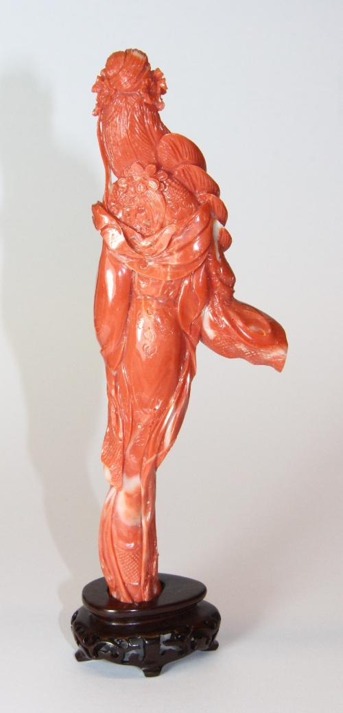 A very fine Chinese carved natural pink coral figure of a young woman with hardwood stand H 17cm - Image 3 of 3
