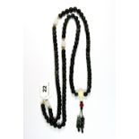 A strand of spinach jade / hardstone Buddhist prayer beads