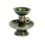 A small marbled Chinese pottery oil lamp H 9cm