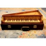 A cased 20th century spinet 68cm x 41cm