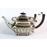 A heavy hallmarked silver teapot