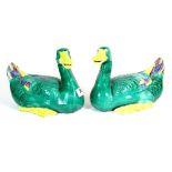 A pair of Chinese Canton enamelled mid 20th century porcelain ducks L 23cm (1 A/F to claw)