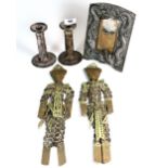 A pair of early 20th century Chinese soft metal candlesticks, soft metal photo frame and a pair of