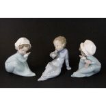 3 Lladro figures of babies with bottles