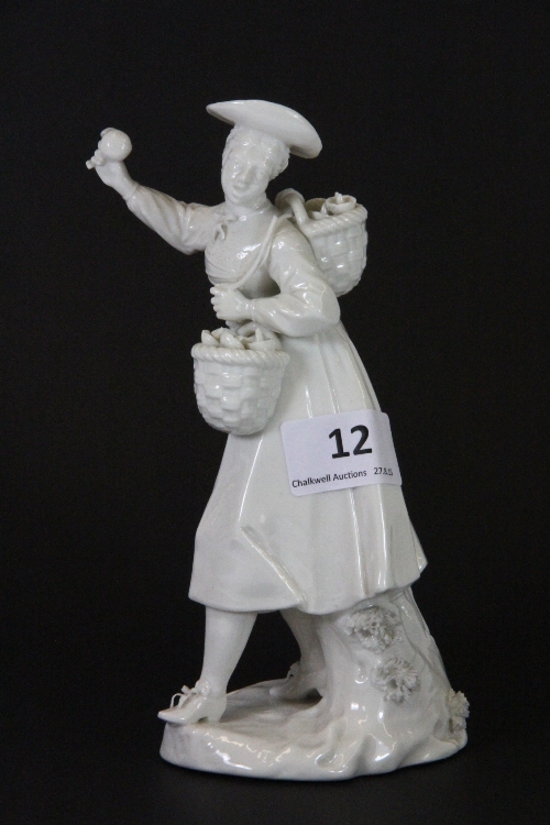 A continental porcelain figure of a lady, H 19cm