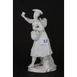 A continental porcelain figure of a lady, H 19cm