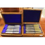 2 cased cutlery sets