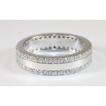 A 925 silver and stone set double eternity/wedding ring (R.5)