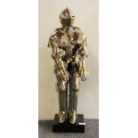 A steel model of a knight in armour, H 70cm