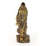 A Chinese gilt carved wooden figure, H 25cm