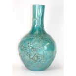 A lovely Chinese turquoise glazed and relief decorated porcelain vase, circa 1900, H 40cm