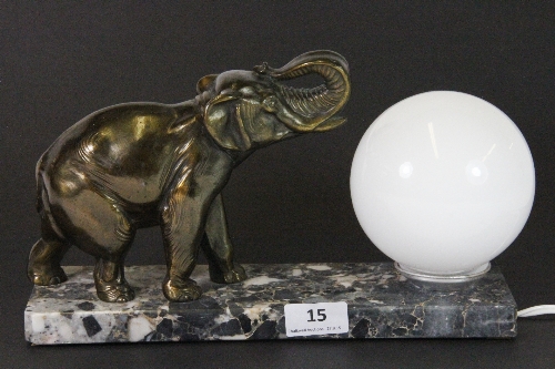 An Art Deco marble and spelter elephant lamp, W 29cm