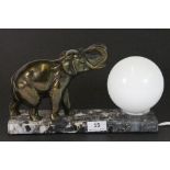 An Art Deco marble and spelter elephant lamp, W 29cm