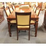 A superb large Charles Barr mahogany reproduction extending dining table and 8 upholstered