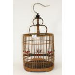 A Chinese bamboo finch cage with porcelain feeders, H 62cm