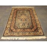 A fine hand-woven Persian wool rug, 200 x 125cm