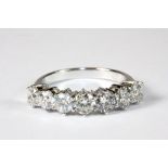 An 18ct white gold 7 stone diamond ring (approx. 1.73ct) (O) Est. £1000 - 1500