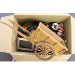 A box of mixed wooden and metal items