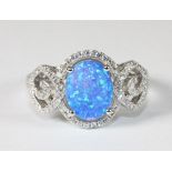 A pretty 925 silver and blue faux opal ring (Q)