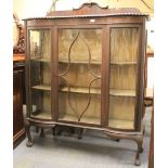 A mahogany veneered ball and claw foot display cabinet, W 122cm, H 154cm