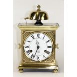 A striking Dutch brass mantle clock