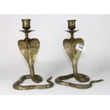 A pair of 19th century Indian brass snake candlesticks, H 24cm