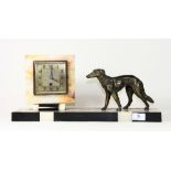 An Art Deco marble and spelter mantle clock, W 45cm