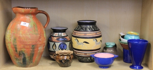 A quantity of Devon and Cornish pottery items